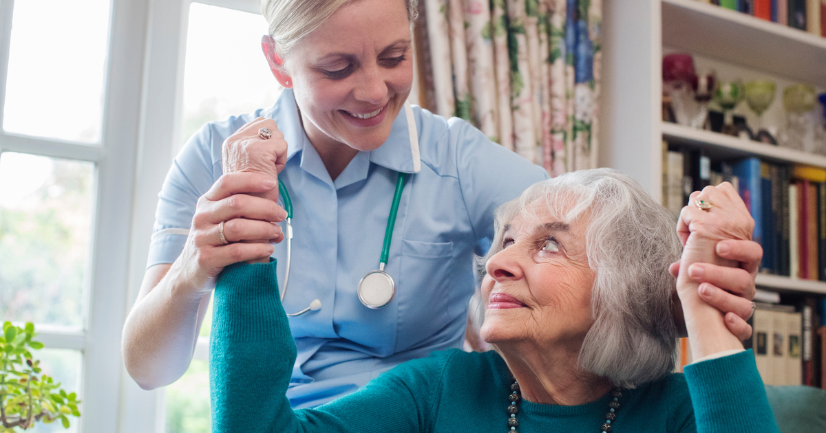 Caregiver assisting stroke victim