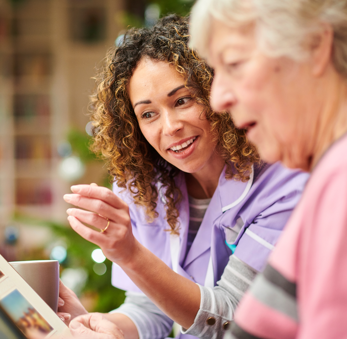 reading-with-elderly caregiver with elderly