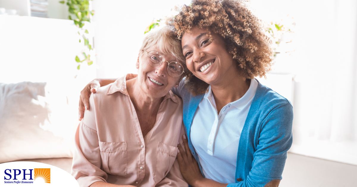 A caregiver enjoys professional caregiving as she helps a senior client.