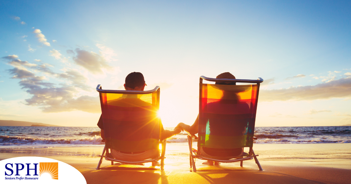 Caregiver travel hacks can help couples like this one on the beach enjoy their vacation.