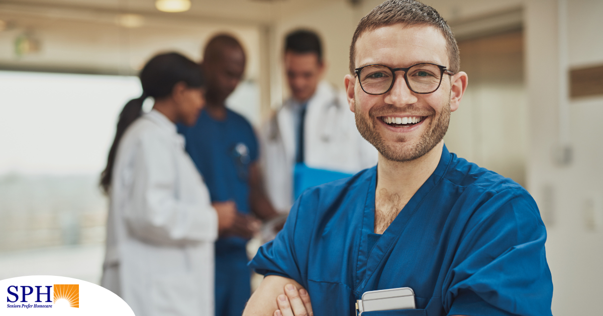 A young man in healthcare smiles, representing how a career as a professional caregiver can lead to a happy career as a healthcare professional.