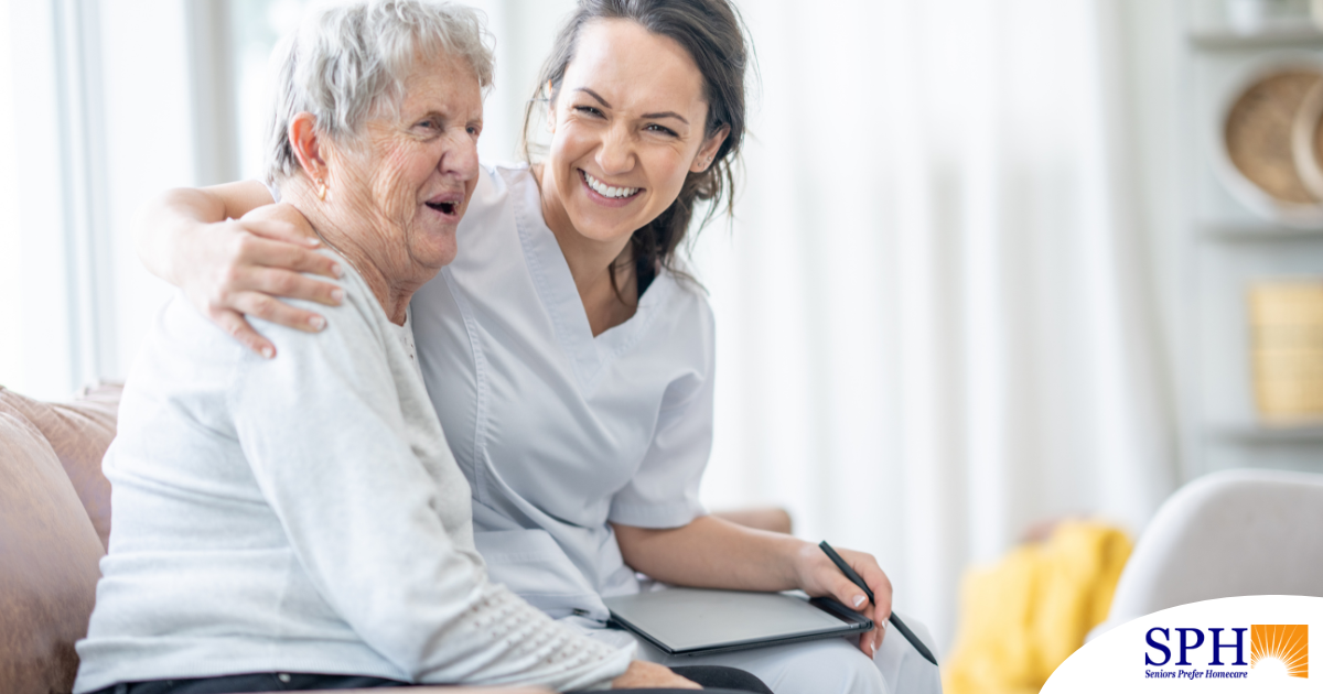 A professional caregiver embraces a senior client, showing the level of trust and comfort between them.