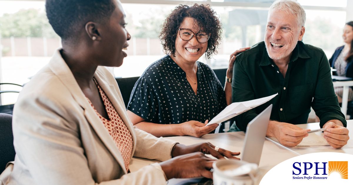 A couple talks with and advisor, representing the type of preparation that is crucial for successful senior care planning.