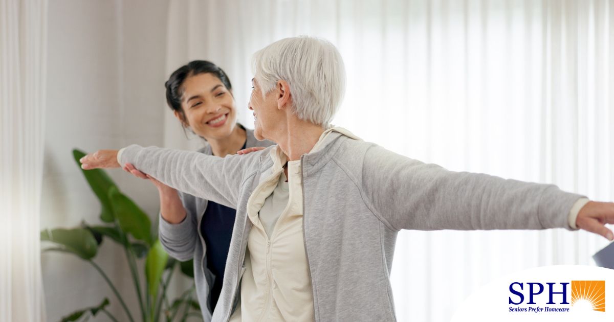A caregiver and senior practice tai chi as one of many enriching activities for seniors at home.