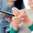 A caregiver provides in home care services to a senior with arthritis