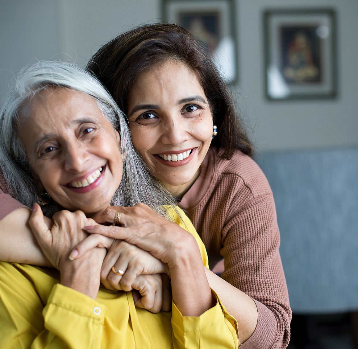 Live In or 24 Hour Senior Care in New Hope Caregiver embracing a senior woman at home during live in or 24 hour senior care in New Hope, AL