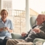 A caregiver provides Memory Care at Home to a senior