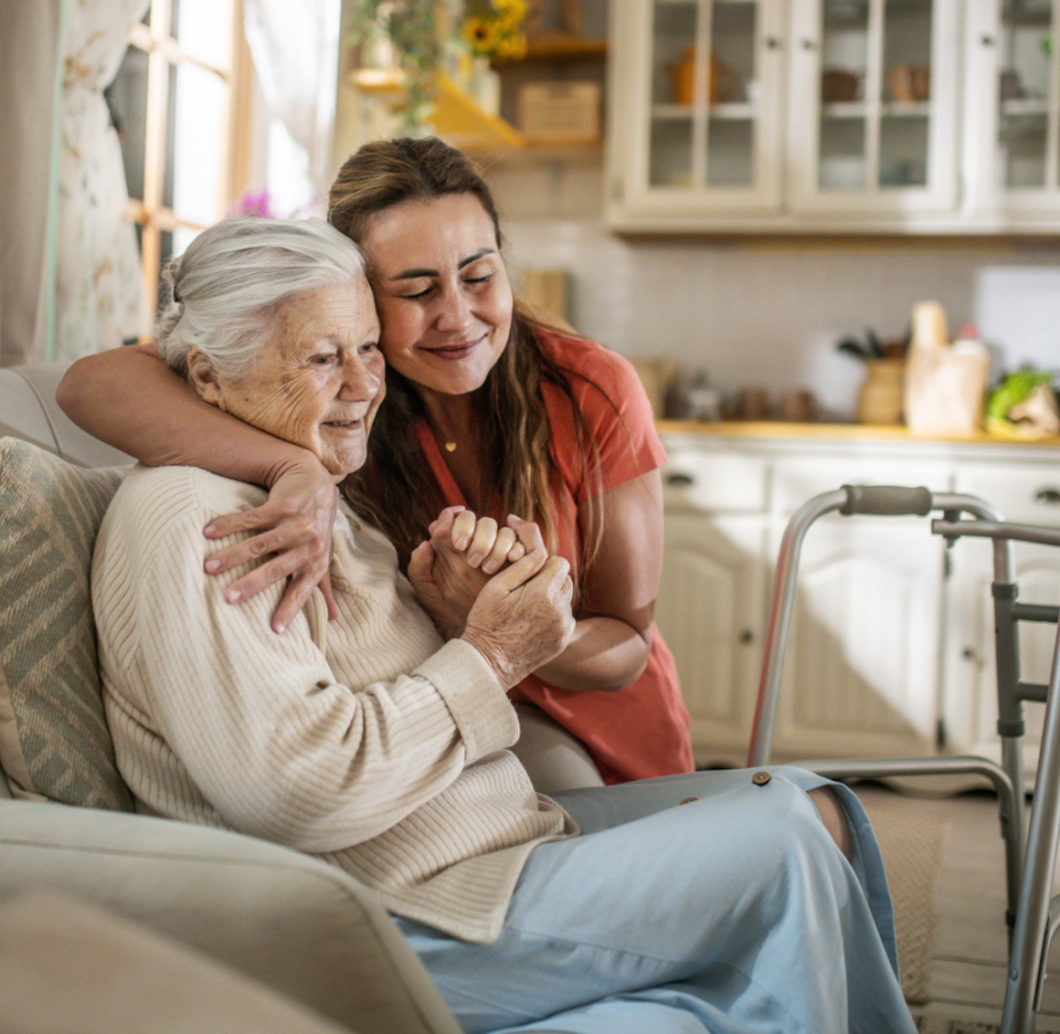 _Respite Care in Cottondale, AL Senior woman receiving compassionate support and companionship at home through Respite Care in Cottondale, AL, while spending time with a caring companion.